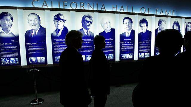 Guests attend a preview of the California Hall of Fame’s inaugural class Dec. 6, 2006, at the California Museum in Sacramento. The museum’s Board of Trustees said Wednesday that it is working to remove Cesar Chavez, far left, from the Hall of Fame following allegations of widespread sexual abuse of girls and woman.